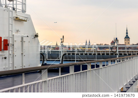 Passenger ferry deck approaching Tallinn harbor with old town skyline 141973670
