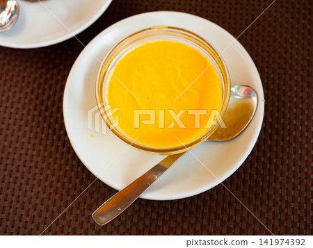 Mango mousse served in bowl for dessert Mango mousse served in bowl for dessert 141974392