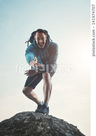 Climbing, helping and hand with man and fitness with backpack and mountain workout. Outdoor, nature and above with journey and adventure with a smile and portrait in on vacation with exercise Climbing, helping and hand with man and fitness with backpack and mountain workout. Outdoor, nature and above with journey and adventure with a smile and portrait in on vacation with exercise 141974707