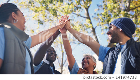 Volunteer, people and high five for unity outdoor, happy with support and charity together. Team building, smile and below group with community hands for outreach, mission and social responsibility Volunteer, people and high five for unity outdoor, happy with support and charity together. Team building, smile and below group with community hands for outreach, mission and social responsibility 141974738