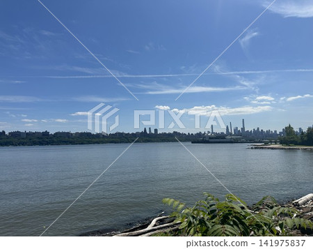A summer view overlooking the Hudson River and the Manhattan skyline. A summer view overlooking the Hudson River and the Manhattan skyline. 141975837
