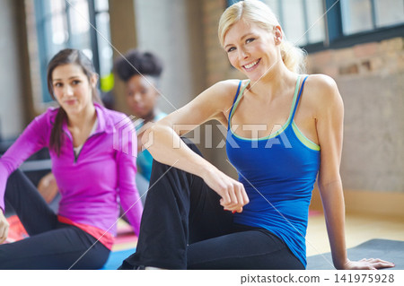 Portrait, woman and fitness with class in gym for cardio workout, morning training and routine. Women, smile and diversity with people for teamwork, collaboration and exercise at health club Portrait, woman and fitness with class in gym for cardio workout, morning training and routine. Women, smile and diversity with people for teamwork, collaboration and exercise at health club 141975928