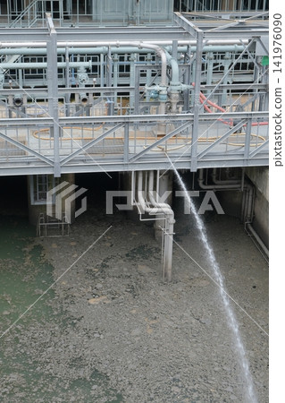 Sedimentation basin at a sewage treatment plant Sedimentation basin at a sewage treatment plant 141976090