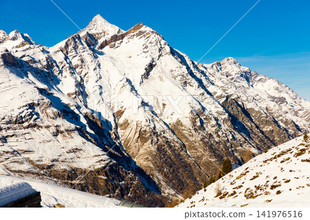 Winter alpine landscape near Zermatt with snow covered mountains, Switzerland 141976516