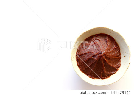Smooth bean paste viewed from directly above against a white background. 141979145