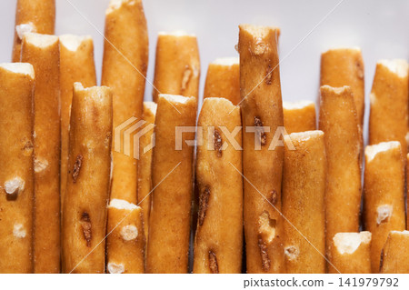 Pretzel Sticks Stacked Upright Against Neutral Background Closeup Macro Studio Lighting Showing Pretzel Sticks Stacked Upright Against Neutral Background Closeup Macro Studio Lighting Showing 141979792