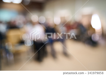 Audience Seated Listening Lecture Hall Conference Attendees In Auditorium Front Row Out Of Focus 141979858