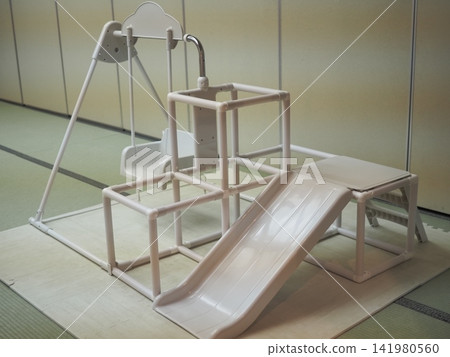 Multi-purpose indoor play equipment (swings, slides, jungle gym) 141980560