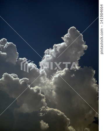 White clouds fluttered in the blue sky. White clouds fluttered in the blue sky. 141984664
