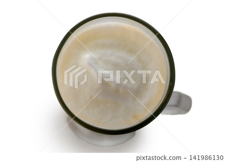 Top view of latte macchiato coffee with creamy milk foam in a glass mug 141986130