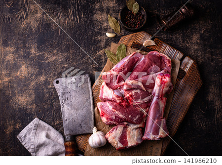 Raw leg of lamb, ready to cook Raw leg of lamb, ready to cook 141986210