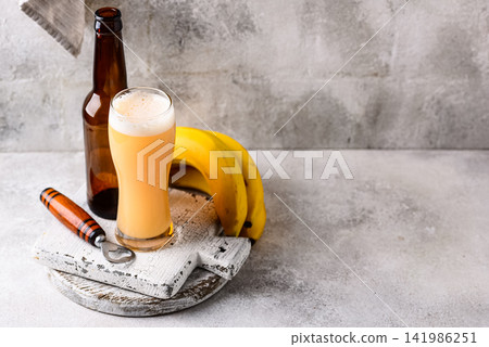 Craft banana beer or cider, non alcoholic drink Craft banana beer or cider, non alcoholic drink 141986251