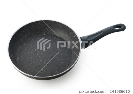 Non-stick frying pan ready for culinary adventures in a bright kitchen Non-stick frying pan ready for culinary adventures in a bright kitchen 141986610