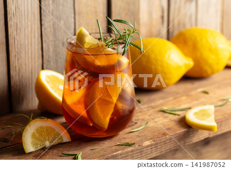 Black tea with ice and lemon. Black tea with ice and lemon. 141987052
