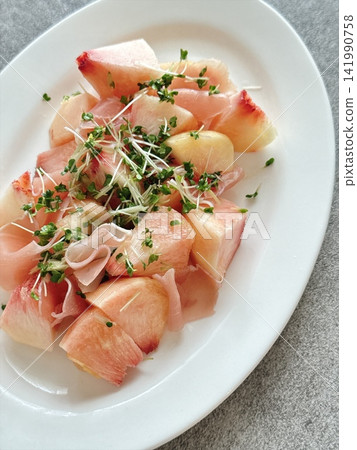 Peach and prosciutto arrangement Peach and prosciutto arrangement 141990758