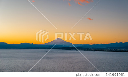 Mount Fuji view from Sagami Bay at sunset in Kanagawa, Japan Mount Fuji view from Sagami Bay at sunset in Kanagawa, Japan 141991961