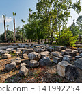 Ancient architectural fragments of Hadrian Gate in the historical site of Perge, Antalya, Turkey 141992254