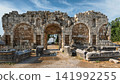 Ancient ruins of the Late Roman Gate in the historic city of Perge, Antalya, Turkey 141992255