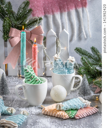Christmas tree meringue pops in winter setting Christmas tree meringue pops in winter setting 141992420