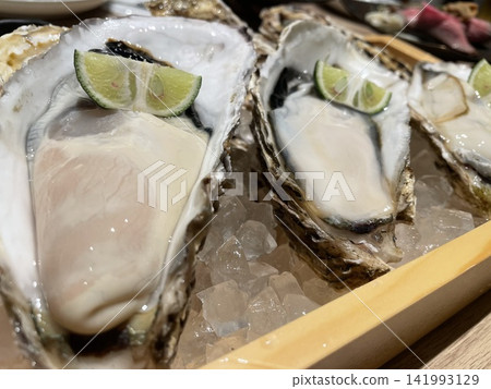 Fresh raw oysters Fresh raw oysters 141993129