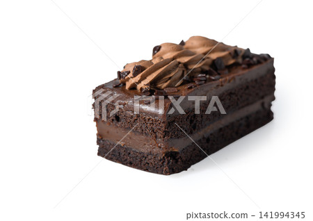 Delightful chocolate cake slice adorned with smooth frosting and coffee sprinkles 141994345
