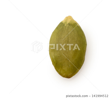 Macro Shot of a Single Shelled Green Pumpkin Seed Macro Shot of a Single Shelled Green Pumpkin Seed 141994512