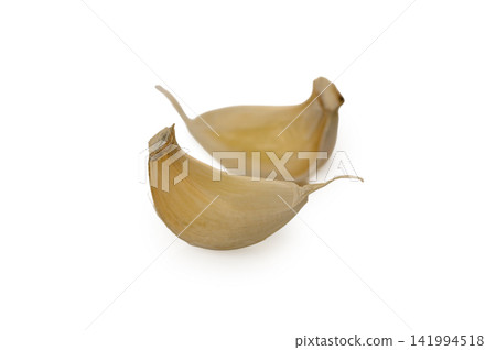 Soft Roasted Garlic Cloves Isolated Soft Roasted Garlic Cloves Isolated 141994518