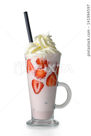 Tall glass of strawberry milkshake with whipped cream and a straw isolated on white Tall glass of strawberry milkshake with whipped cream and a straw isolated on white 141994597