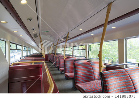 Interior and seats of a London double-decker bus Interior and seats of a London double-decker bus 141995075
