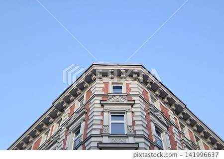 Historic Architectural Facade Against Clear Blue Sky for Urban Design and Inspiration Historic Architectural Facade Against Clear Blue Sky for Urban Design and Inspiration 141996637