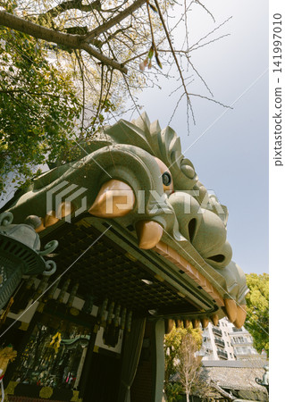 Lion Buddist temple Pagoda at the Namba Shrine in Osaka Japan Lion Buddist temple Pagoda at the Namba Shrine in Osaka Japan 141997010