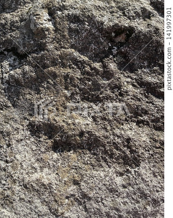 A rugged, rocky texture material; a background that expresses strength, solidity, foundation, and the power of nature. A rugged, rocky texture material; a background that expresses strength, solidity, foundation, and the power of nature. 141997301
