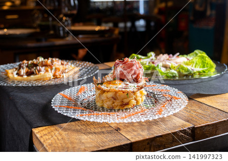 Gourmet dish on restaurant table Gourmet dish on restaurant table 141997323