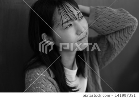 Image of a troubled woman (black and white) Image of a troubled woman (black and white) 141997351