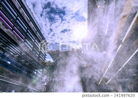 Yokohama, Japan, cityscape, August 14th. Intense heat... Mist showers have appeared in front of the Zenrin Gate in Chinatown... Feels great... Yokohama, Japan, cityscape, August 14th. Intense heat... Mist showers have appeared in front of the Zenrin Gate in Chinatown... Feels great... 141997620