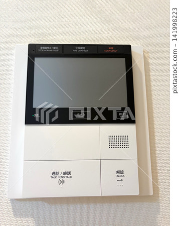 Intercom master unit with monitor installed inside an apartment Intercom master unit with monitor installed inside an apartment 141998223