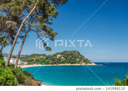 Coastal bay and turquoise sea in Lloret de Mar on Costa Brava Coastal bay and turquoise sea in Lloret de Mar on Costa Brava 141999110