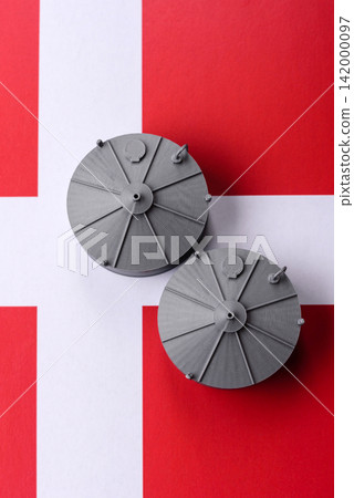 Liquefied gas storage tanks set against the Danish money as a background for your design Liquefied gas storage tanks set against the Danish money as a background for your design 142000097