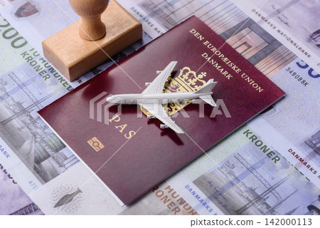 Denmark, Danish passport or id document with tickets for flight, travel. Danish passport Denmark, Danish passport or id document with tickets for flight, travel. Danish passport 142000113