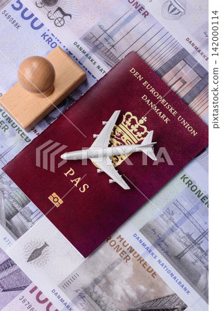 Denmark, Danish passport or id document with tickets for flight, travel. Danish passport Denmark, Danish passport or id document with tickets for flight, travel. Danish passport 142000114
