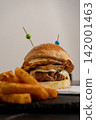 Double Beef Burger with Fried Egg, Melted Cheese and French Fries 142001463