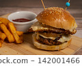 Classic Hamburger with Fried Egg, Cheese and French Fries 142001466