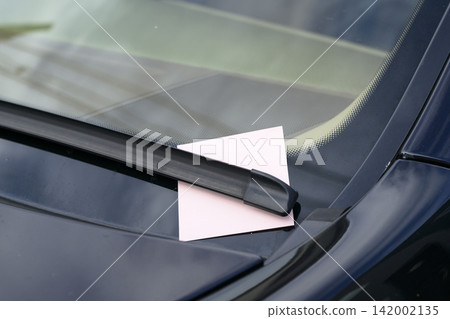 Marking a car to prevent theft (placing paper under the windshield wipers) Marking a car to prevent theft (placing paper under the windshield wipers) 142002135