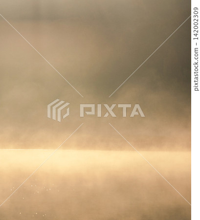 Lake Onbara, its surface shrouded in morning mist. Lake Onbara, its surface shrouded in morning mist. 142002309