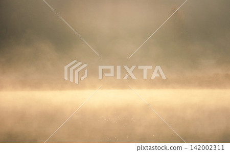 Lake Onbara, its surface shrouded in morning mist. Lake Onbara, its surface shrouded in morning mist. 142002311