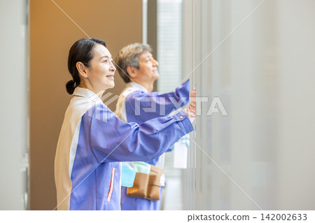 Office building maintenance and cleaning staff Office building maintenance and cleaning staff 142002633