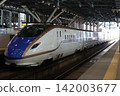 Shinkansen arriving at Toyama Station during the daytime 142003677