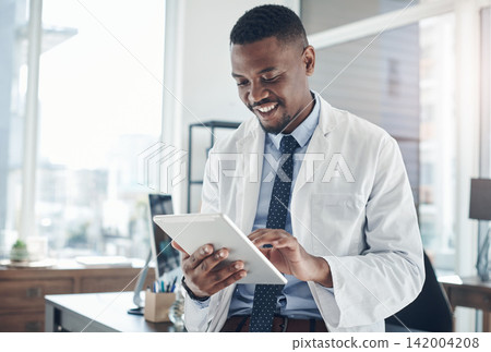 Office, black man and doctor with tablet, smile and telehealth for clinic, serious and online for healthcare. Workplace, hospital and internet and technology for science, medical and research Office, black man and doctor with tablet, smile and telehealth for clinic, serious and online for healthcare. Workplace, hospital and internet and technology for science, medical and research 142004208