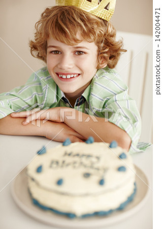 Birthday party, cake and boy in portrait with smile in family home for celebration, growth or milestone. Dessert, decoration and sweet pastry for event, gift or food for child in dining room at house Birthday party, cake and boy in portrait with smile in family home for celebration, growth or milestone. Dessert, decoration and sweet pastry for event, gift or food for child in dining room at house 142004471