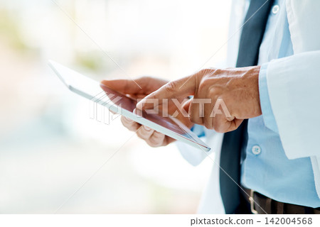 Hospital, clinic and hands of doctor on tablet for medical website, telehealth and internet research. Healthcare, online and person on digital tech for consulting service, wellness app and contact Hospital, clinic and hands of doctor on tablet for medical website, telehealth and internet research. Healthcare, online and person on digital tech for consulting service, wellness app and contact 142004568